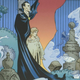 A vampire holds a boy in a graveyard